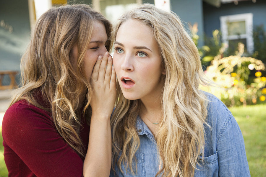 USA, Utah, Provo, Two friends gossiping 