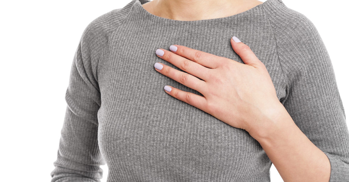 Pain in the chest area. Pain in the chest area. Female silhouette on white background. 