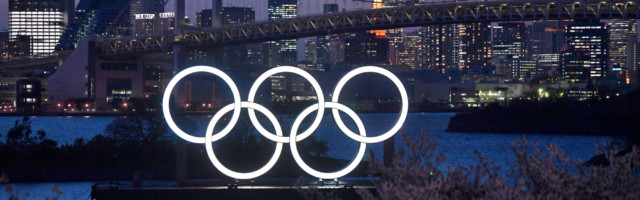 Japanese Government And IOC Agree To Postpone Olympic Games TOKYO, JAPAN - MARCH 25: A boat sails past the Tokyo 2020 Olympic Rings on March 25, 2020 in Tokyo, Japan. Following yesterdays announcement that the Tokyo 2020 Olympics will be postponed to 2021 because of the ongoing Covid-19 coronavirus pandemic, IOC officials have said they hope to confirm a new Olympics date as soon as possible. (Photo by Carl Court/Getty Images) 