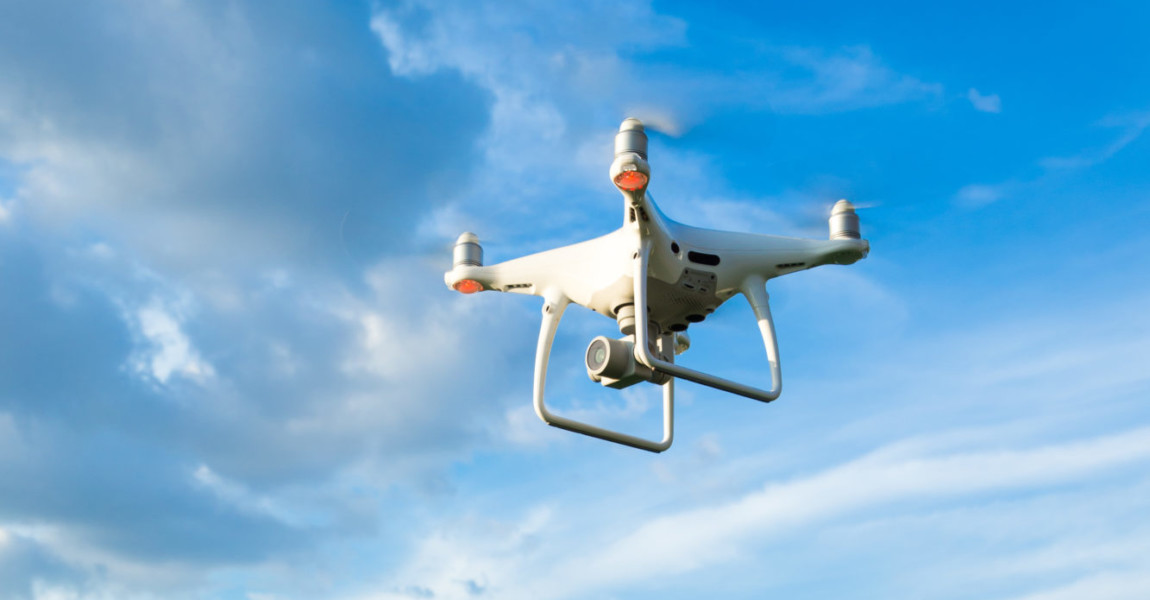 Flying drone above the wheat field Flying drone above the wheat field 