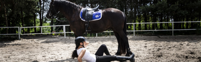 Falling from a horse. Riding accident. Injured woman The woman rider fell off his horse. 