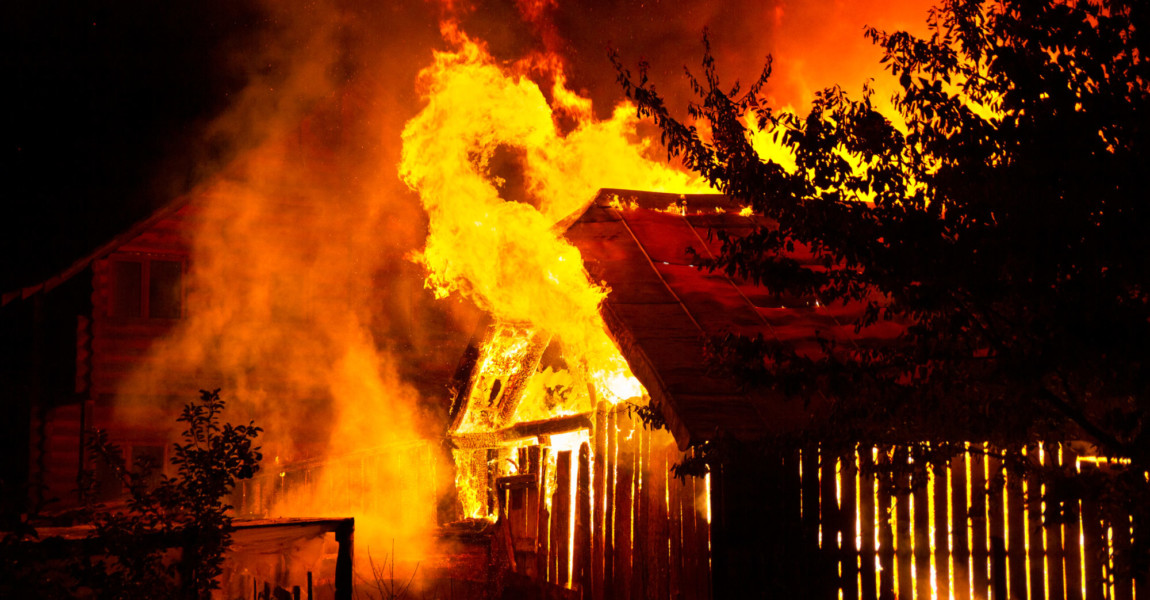 Wooden,House,Or,Barn,Burning,On,Fire,At,Night. Wooden house or barn burning on fire at night. 