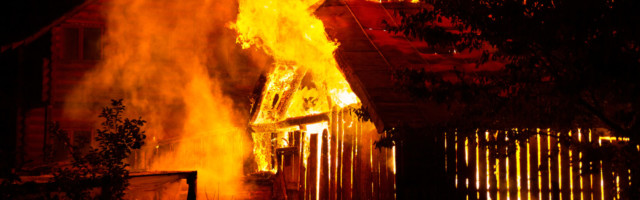 Wooden,House,Or,Barn,Burning,On,Fire,At,Night. Wooden house or barn burning on fire at night. 