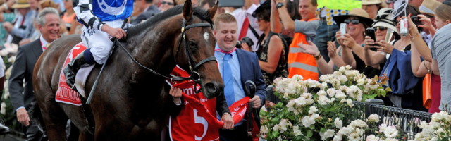 Melbourne Cup 2014 epa04475469 Jockey Ryan Moore riding Protectionist celebrates after crossing the finish line and winning the Melbourne Cup race at Flemington Racecourse in Melbourne, Australia, 04 November 2014. The Melbourne Cup day, sporting several horse races including the world's richest two mile (3,200 meter) race, is cause for major celebrations and betting across Australia. The main race is said to 'stop a nation' and many revellers in fancy clothing attend the races at the Flemington racecourse. EPA/TRACEY NEARMY AUSTRALIA AND NEW ZEALAND OUT ++ 