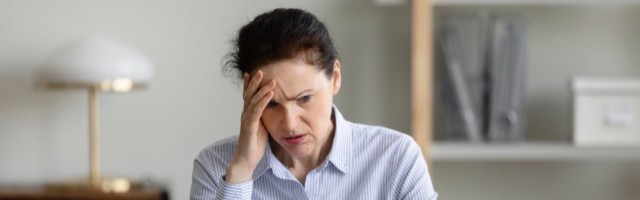 Frustrated stressed senior business woman using laptop Frustrated stressed senior business woman using laptop, looking at screen in shock, feeling upset, panic, realizing mistake, error, failure, problem, getting bad news, touching head 